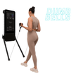 Woman using a fitness device with a screen and resistance band, labeled 'Dumb Bells'.